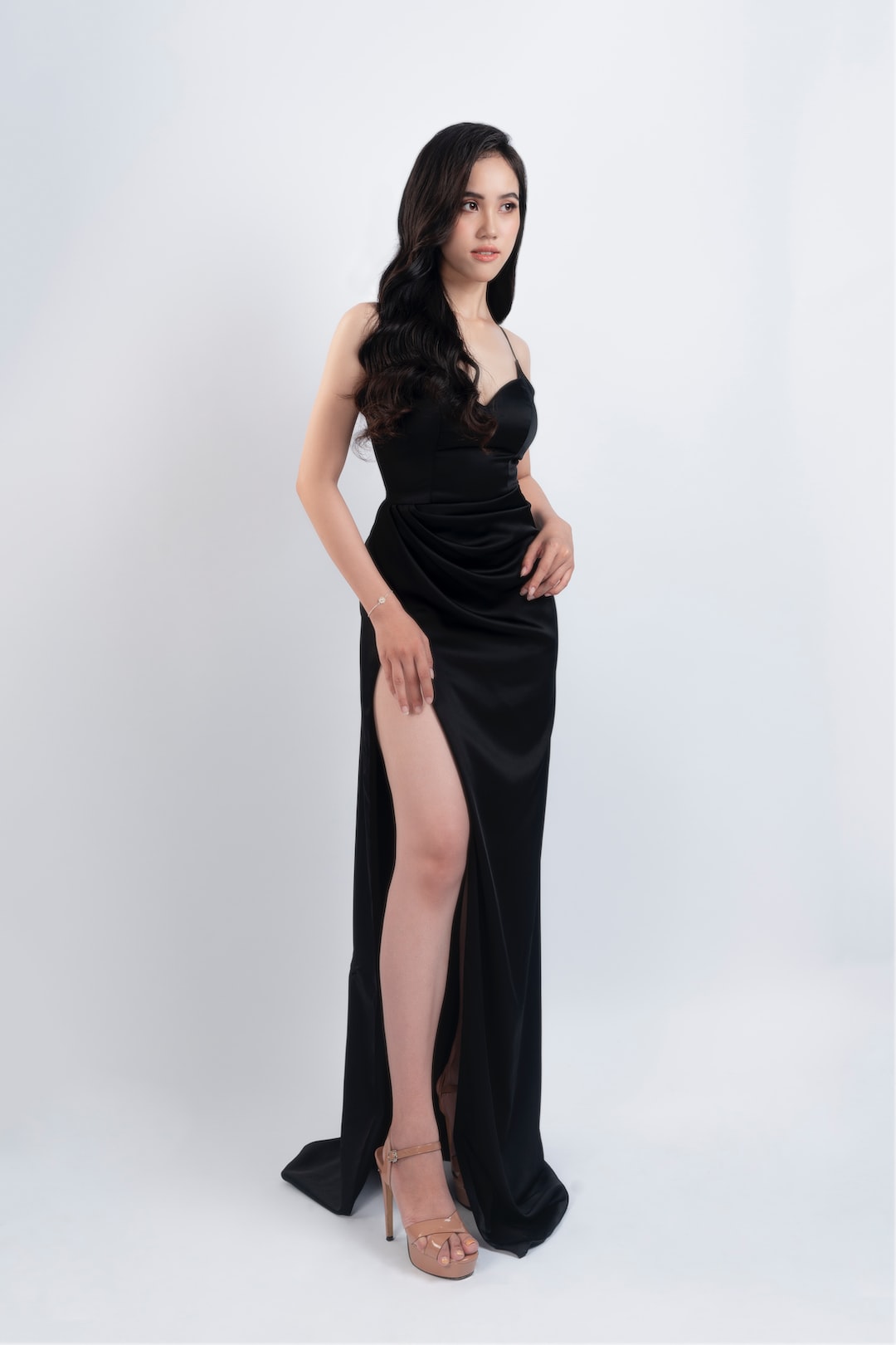 woman in black sleeveless dress