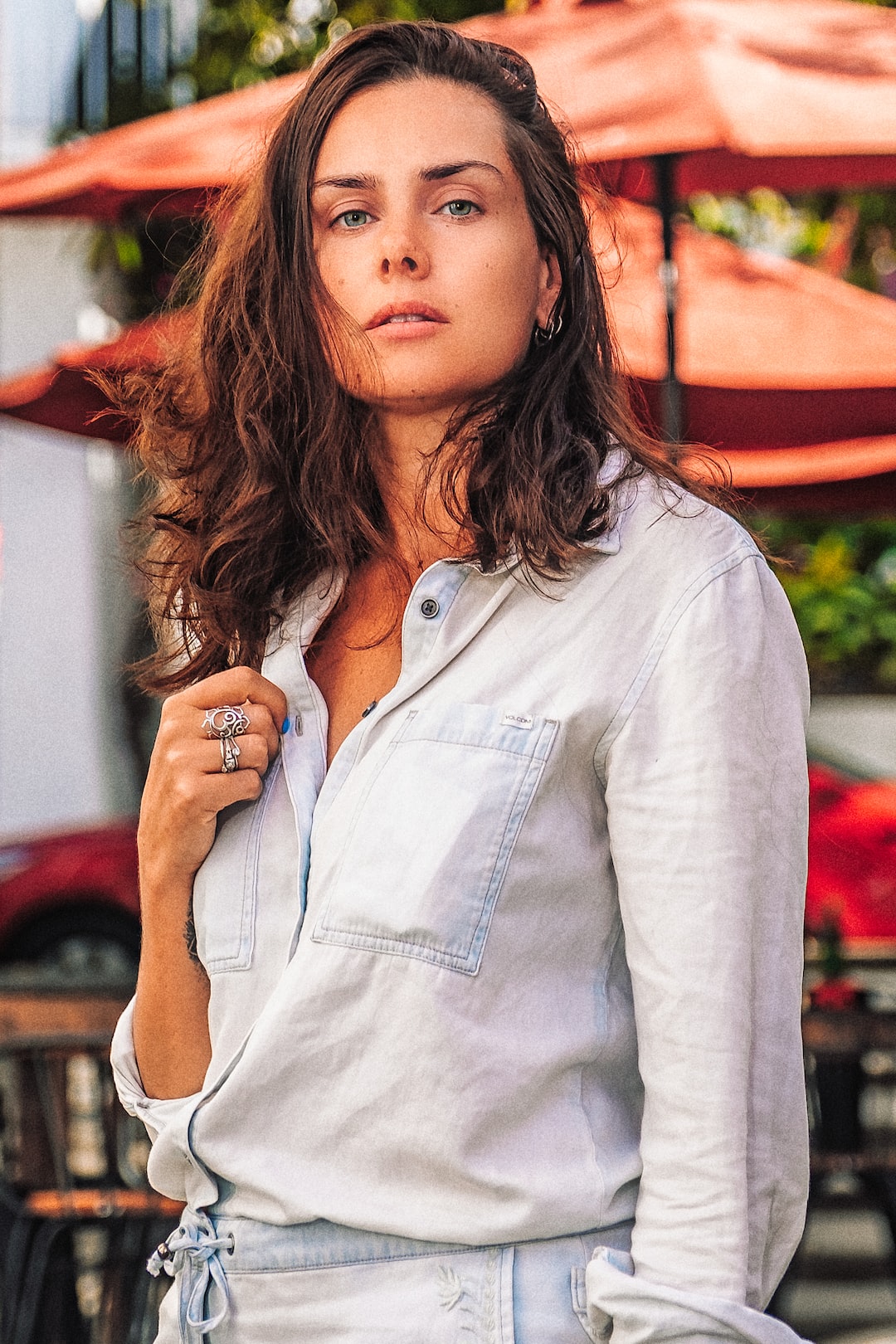 woman in white button up long sleeve shirt