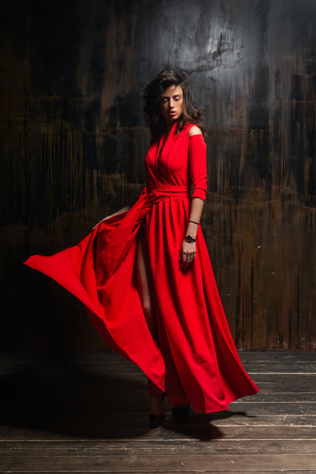 woman wearing red 3/4-sleeved dress